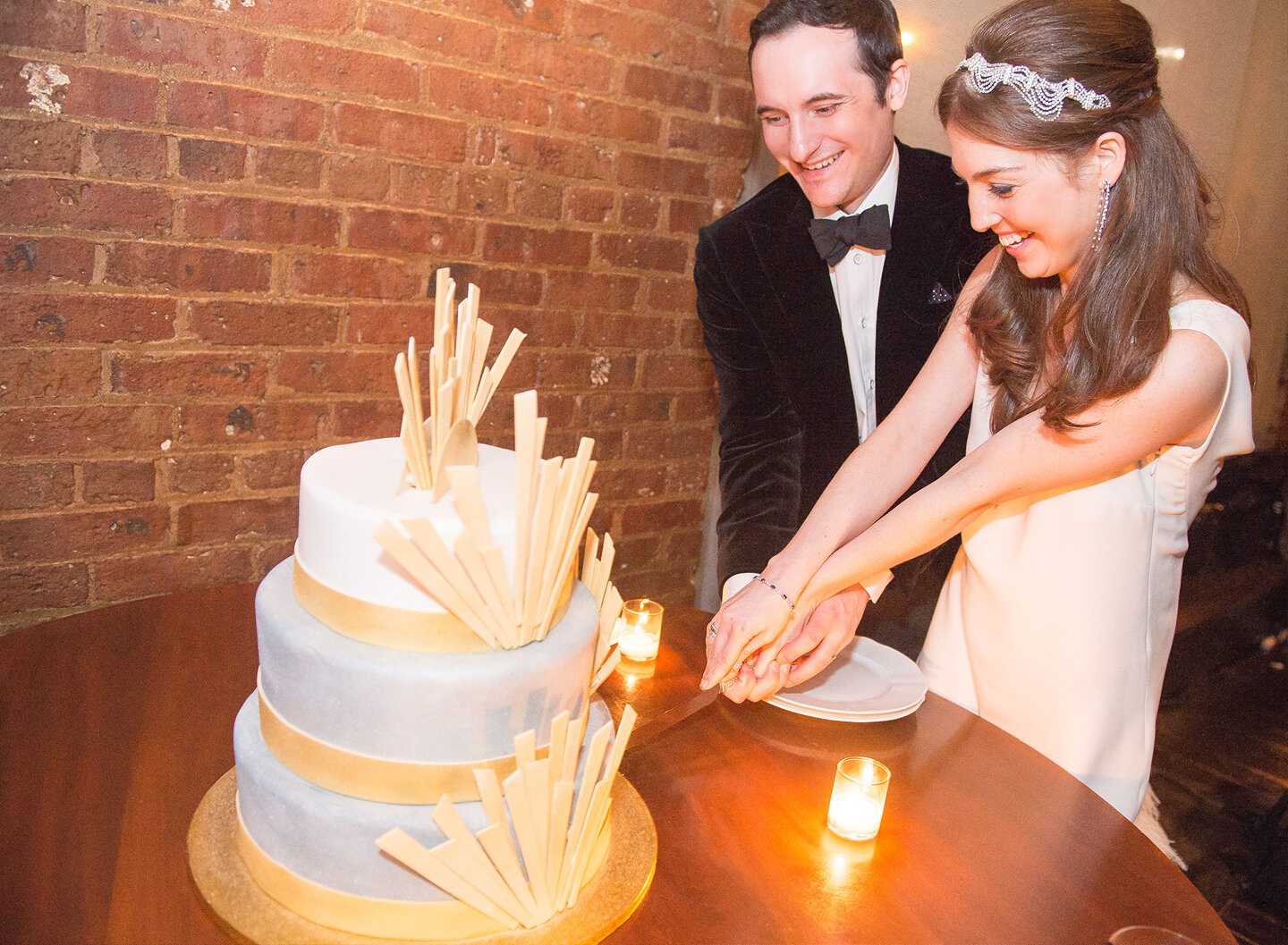 Jill and Mark cutting their wedding cake