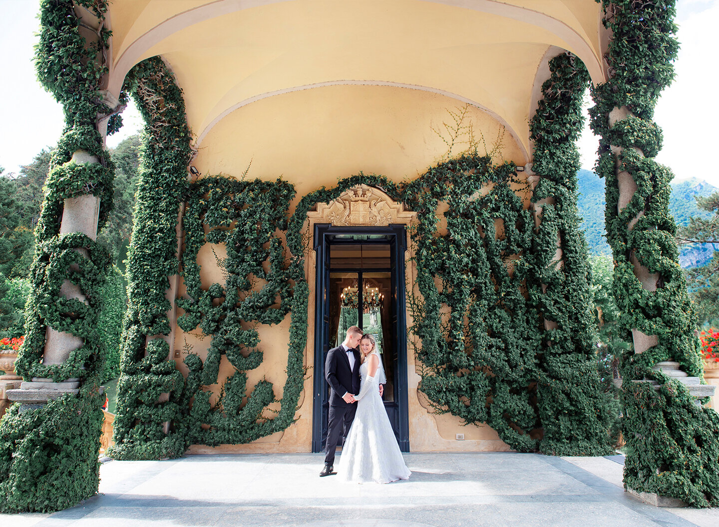 Villa del Balbianello wedding: bride and groom on the villa's elegant porch