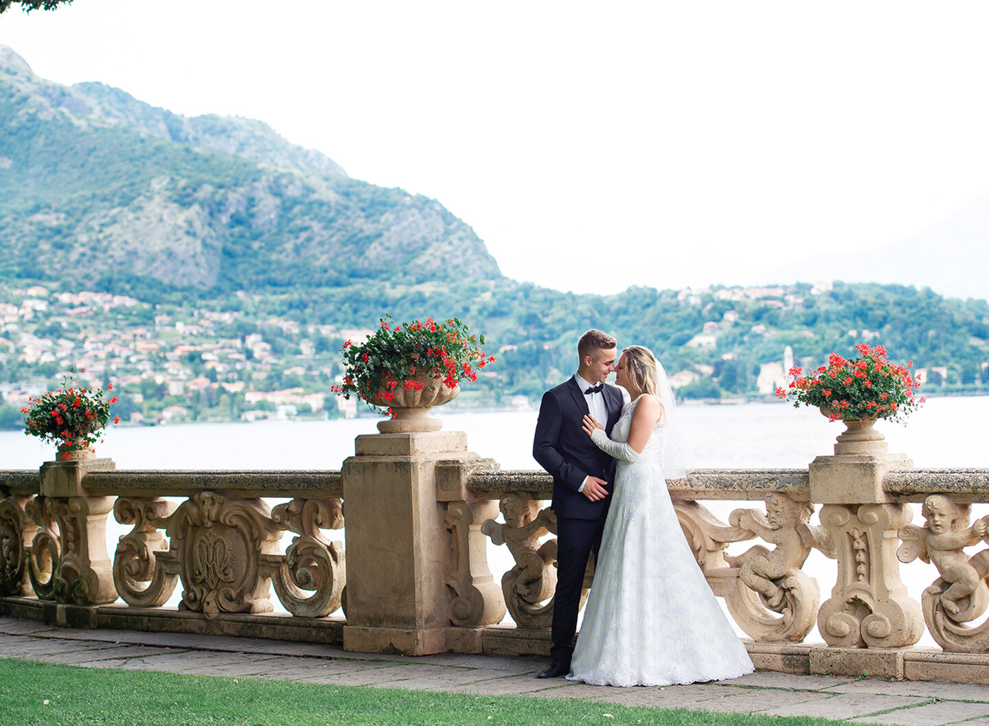 Lake Como elopement, bride and groom hugging on the villa's terrace