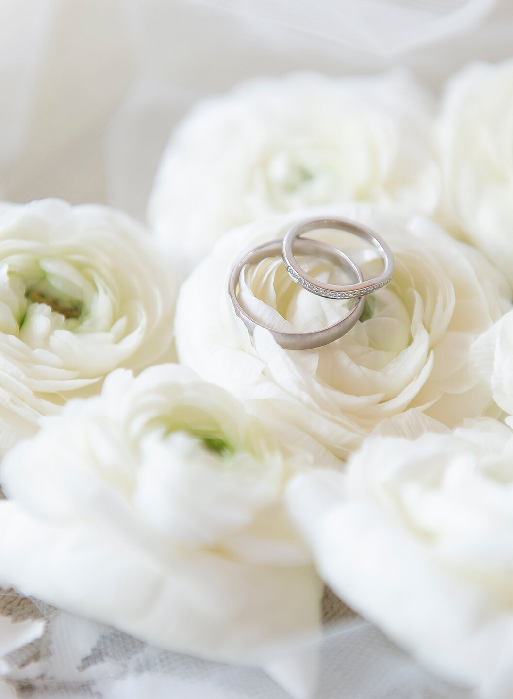 Wedding rings on bridal bouquet