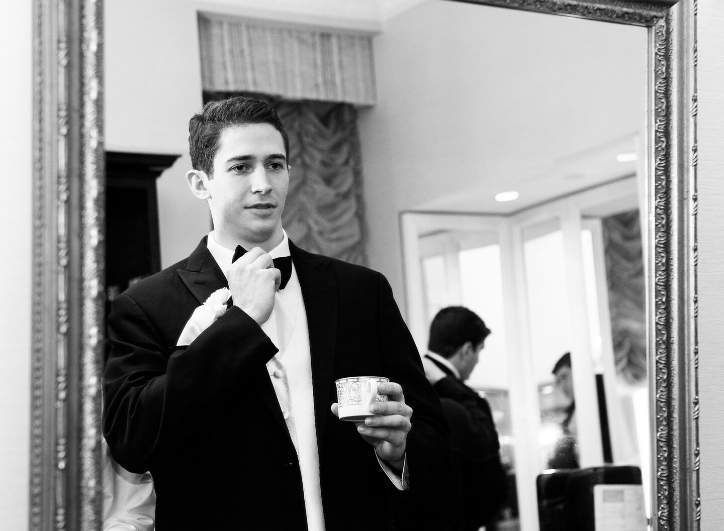 Groom getting ready at the Plaza Hotel