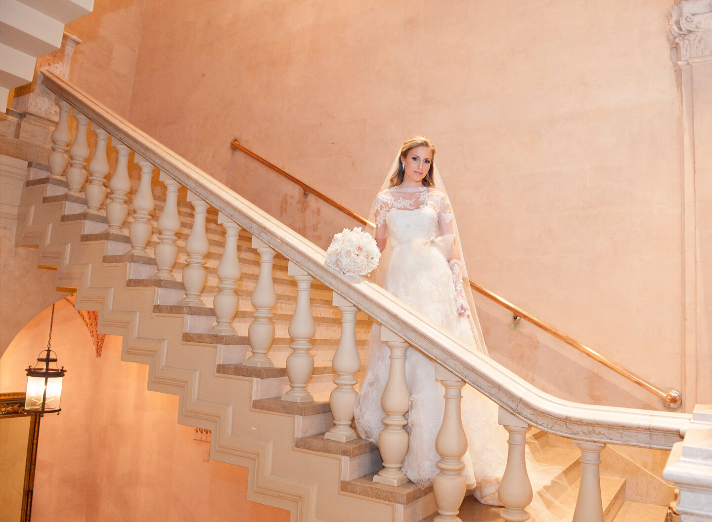 Bride posing in Stairwell at Plaza Hotel